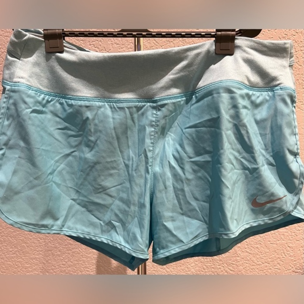 Woman's Nike workout shorts, size L, light blue